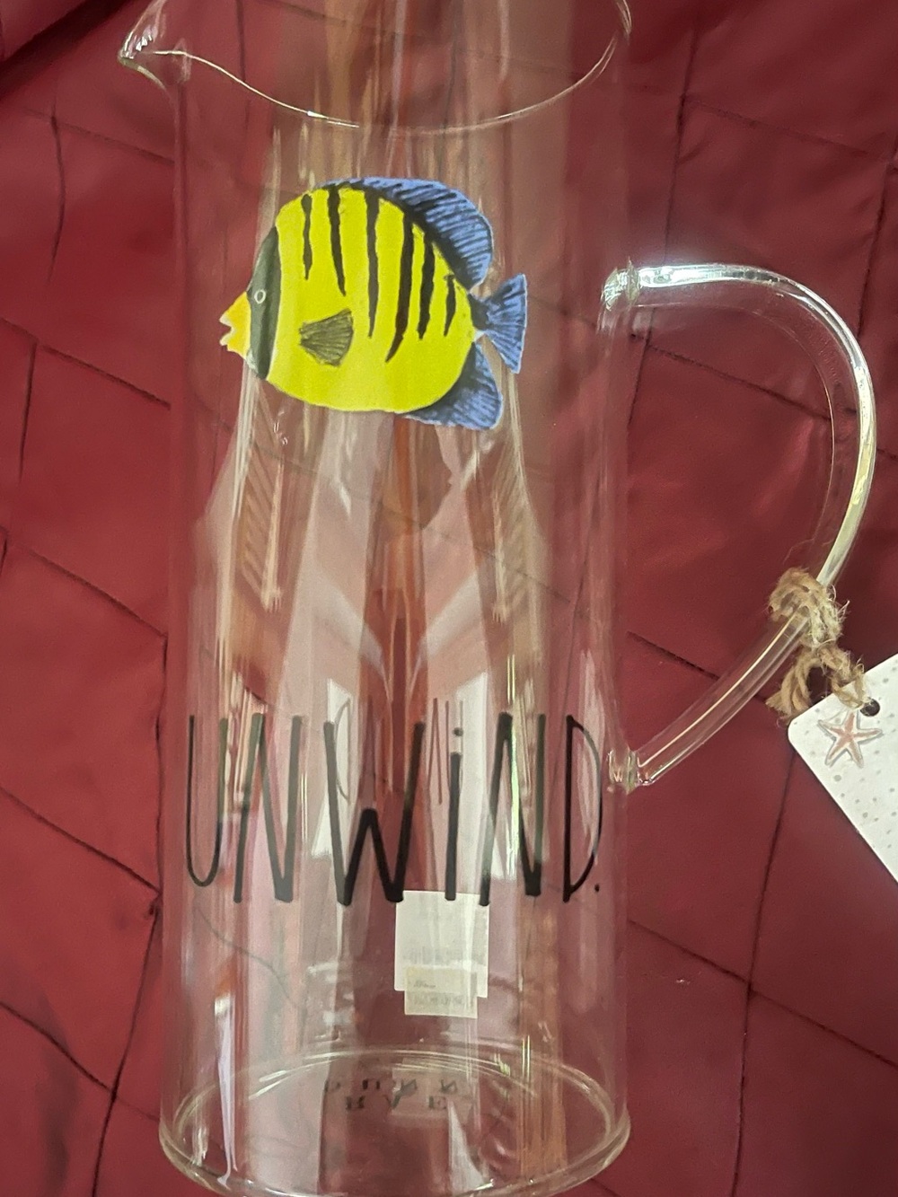 Rae Dunn Glass Pitcher with Yellow & Blue Fish “UNWIND”